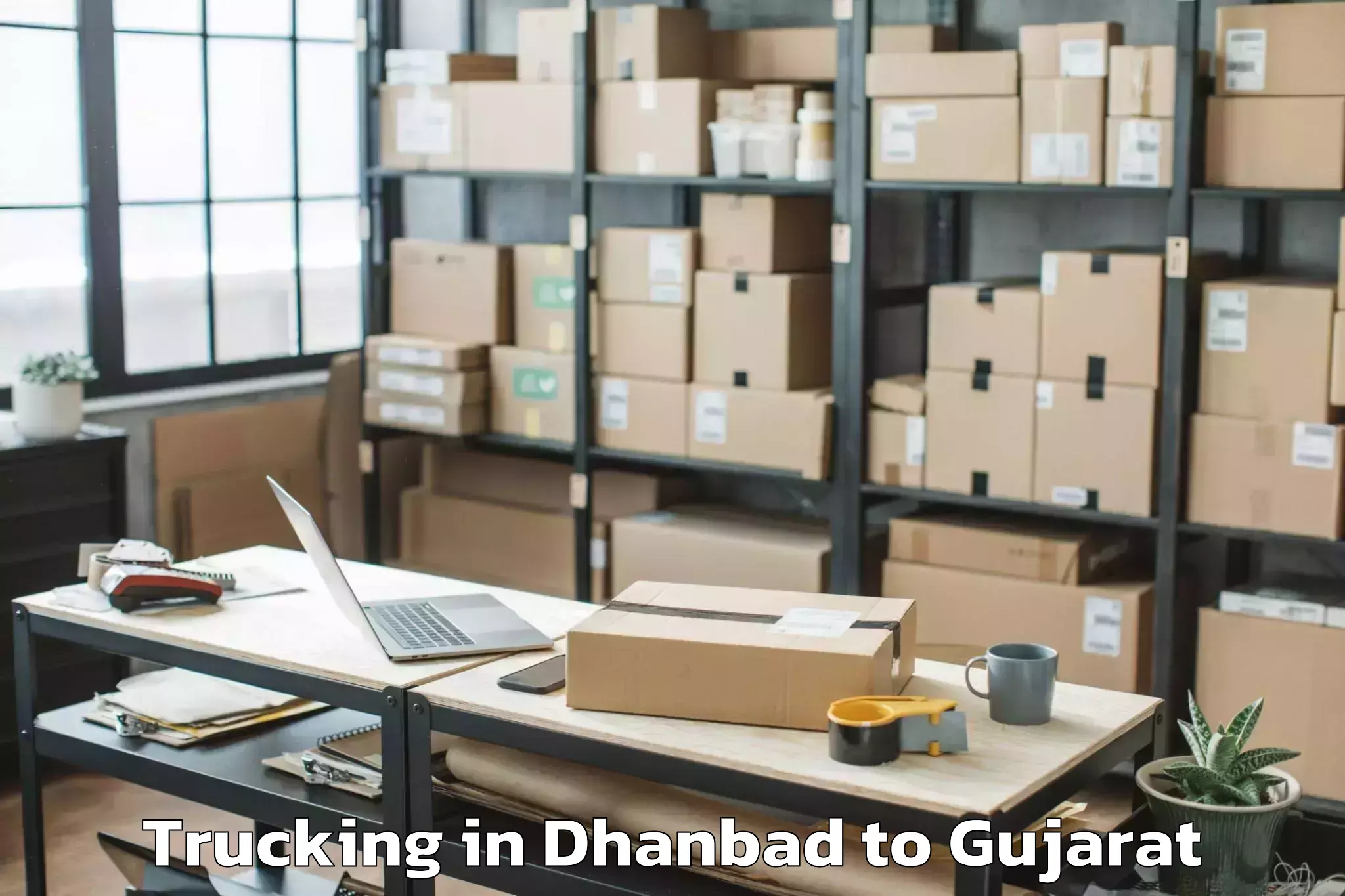 Leading Dhanbad to Ahmadabad City Trucking Provider